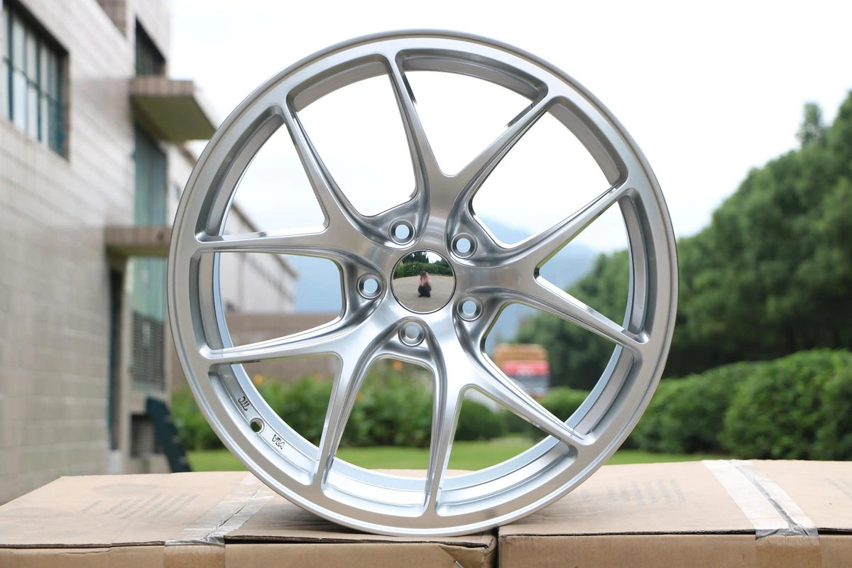 19-inch Vortex Style WheeloutletNJ wheels in sleek hyper black finish with seven-spoke design and machined accents.