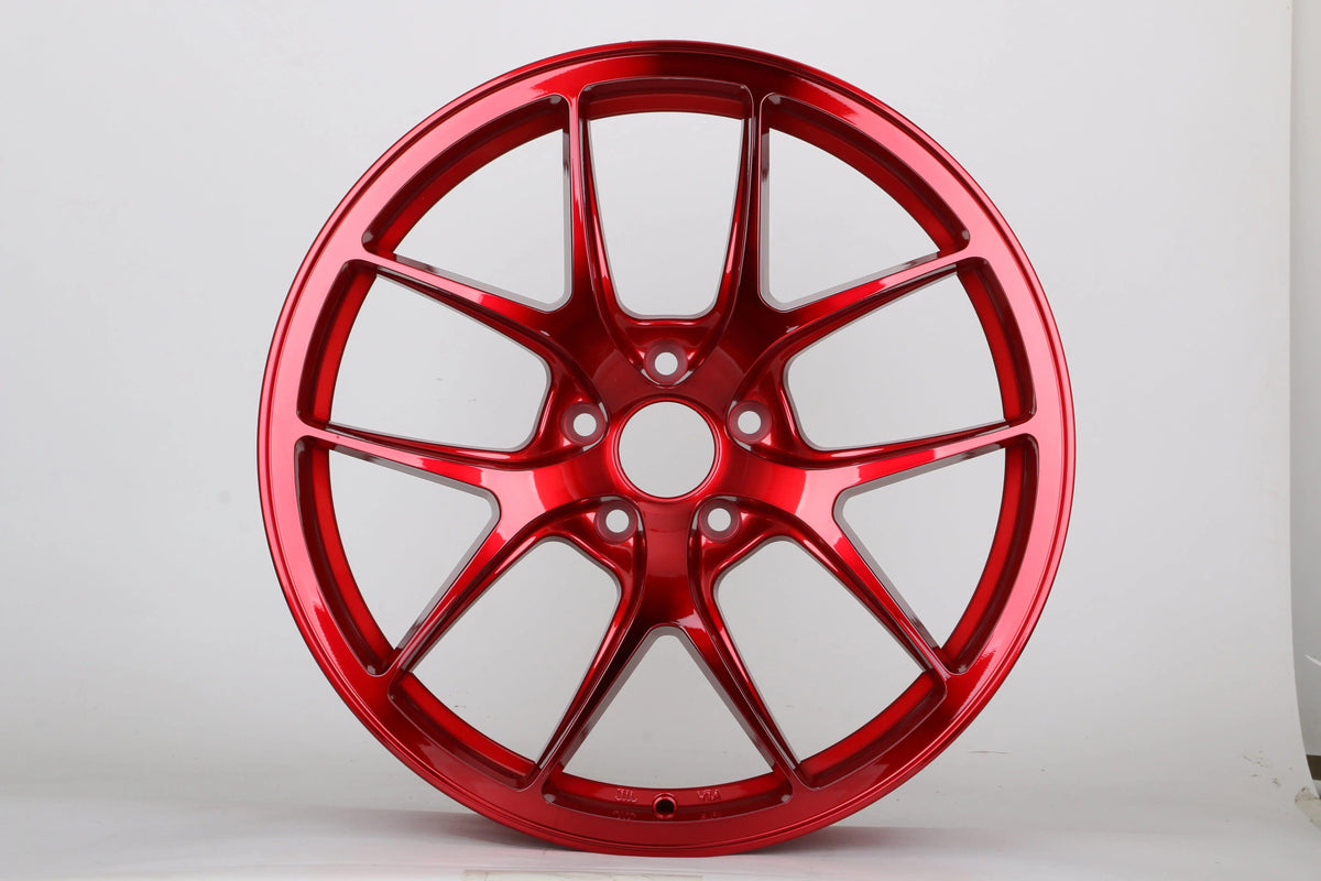 19-inch Vortex Style WheeloutletNJ wheels showing a sleek, modern design with a polished finish on a car.