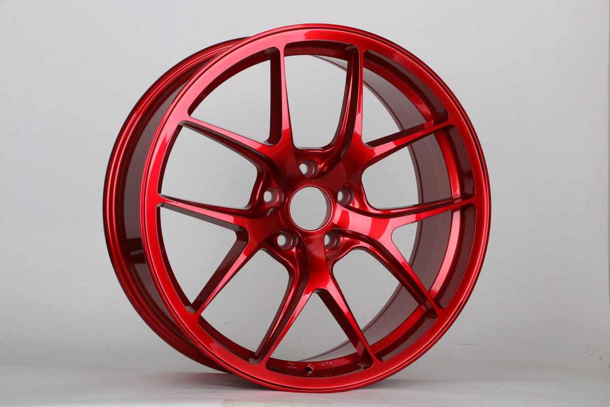 19-inch Vortex Style Wheels by WheeloutletNJ, showcasing sleek alloy rims with intricate spoke design.