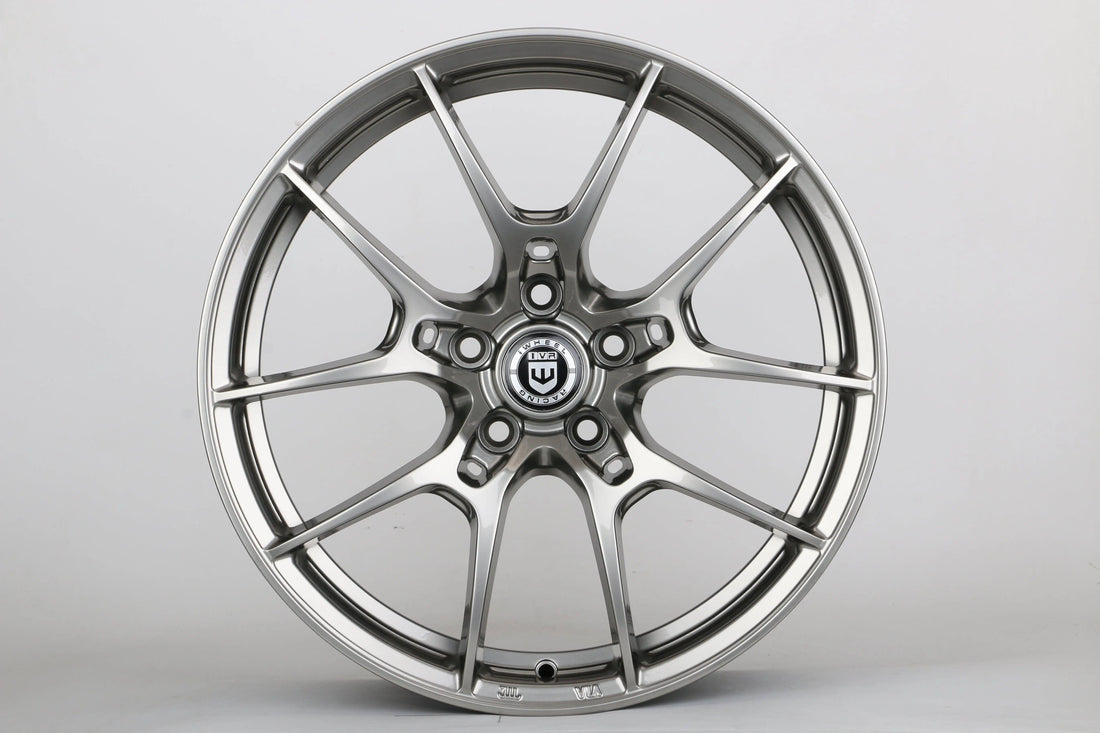Glossy silver multi-spoke alloy wheel for Audi, performance car part on white background