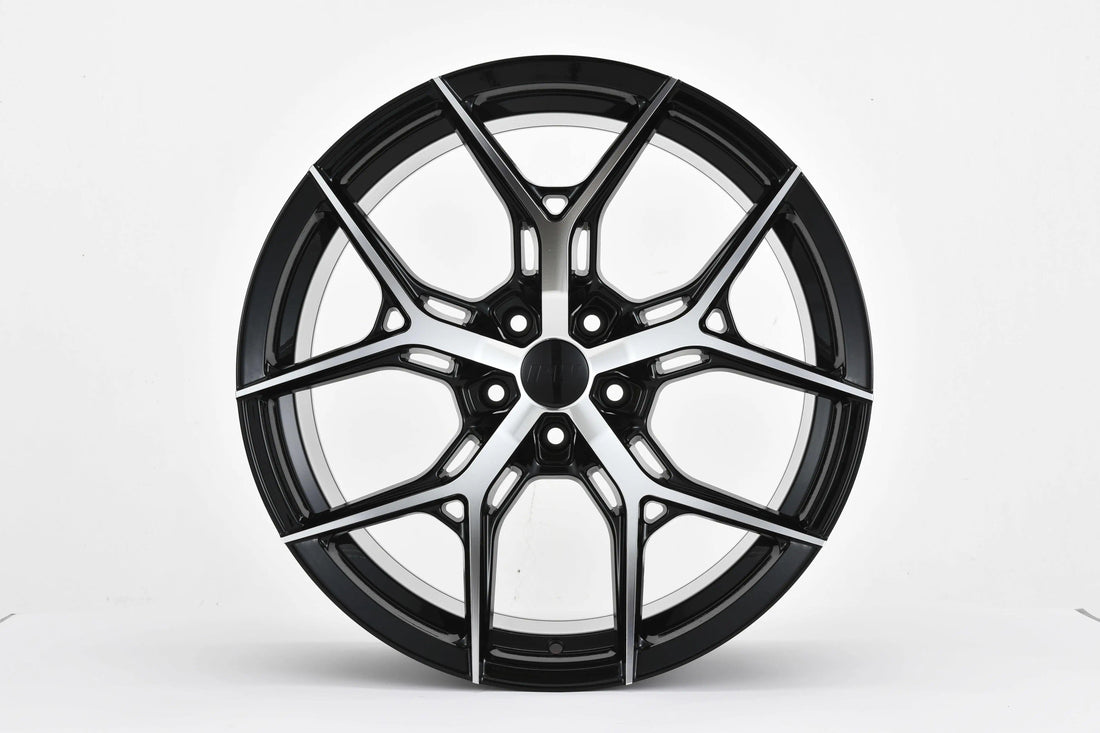 20-inch black machined face Y-spoke style wheels by WheeloutletNJ, showcasing a sleek and modern wheel design.