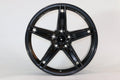18-inch IPW 1546 wheels by WheeloutletNJ with a glossy black finish and machined face, shown on a vehicle.