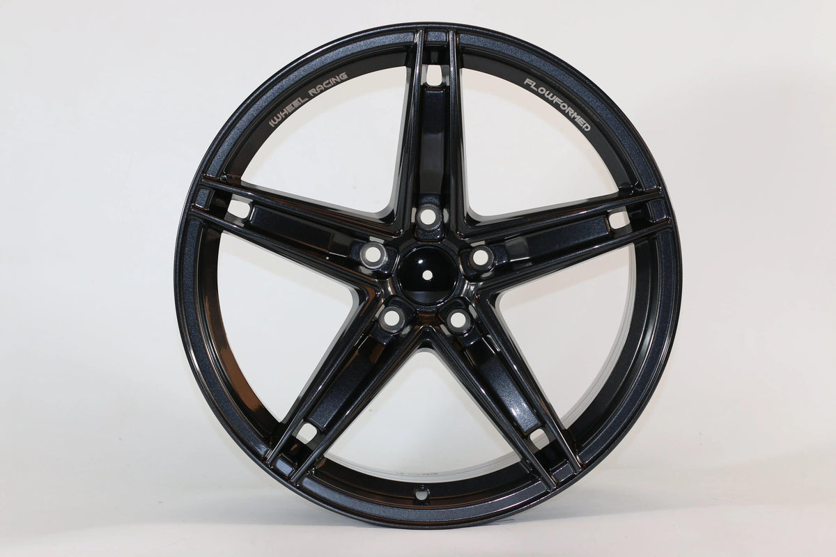 18-inch IPW 1546 wheels by WheeloutletNJ with a glossy black finish and machined face, shown on a vehicle.