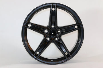 18-inch IPW 1546 wheels by WheeloutletNJ with a glossy black finish and machined face, shown on a vehicle.