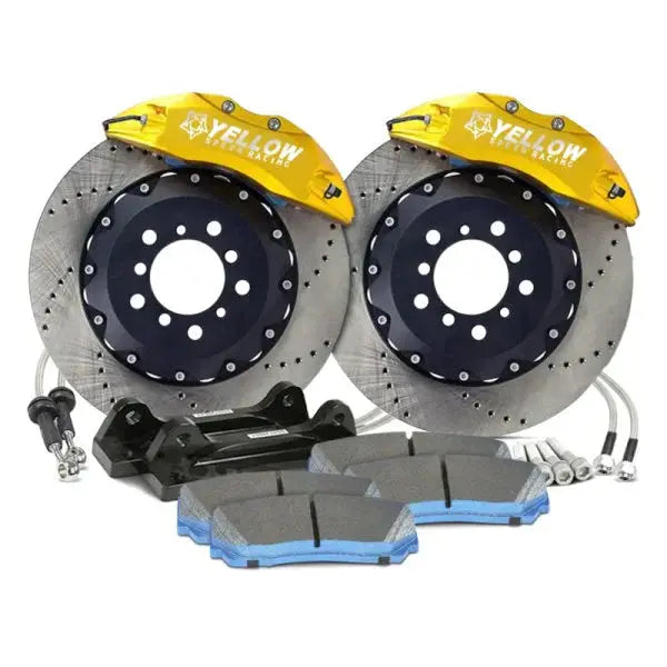 Yellow front big brake kit with calipers, rotors, pads, and hardware for performance cars