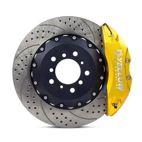 Drilled slotted brake rotor with yellow performance brake caliper for Audi vehicles