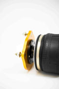 Yellow Speed Racing air strut upper perch for Audi S8 2006-2010, high-performance automotive suspension component.