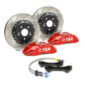 Performance car brake kit with red YSR calipers, slotted rotors, brackets, and brake lines