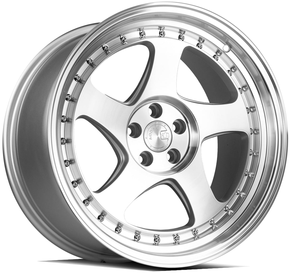 Aodhan Wholesale AH01 15x8 silver machined face wheels with 4x100 and 114.3 bolt pattern and 20 offset on a car.