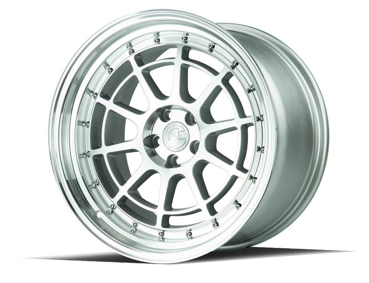 Aodhan Wholesale AH04 15x8 silver machined face wheels with 4x100 and 4x114 bolt patterns on a car rim.