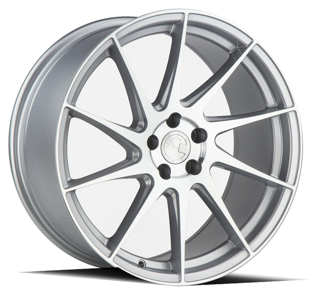 Aodhan Wholesale AH09 18x8 silver-machined face wheels with 5x100 bolt pattern and 35mm offset on a vehicle's driver side