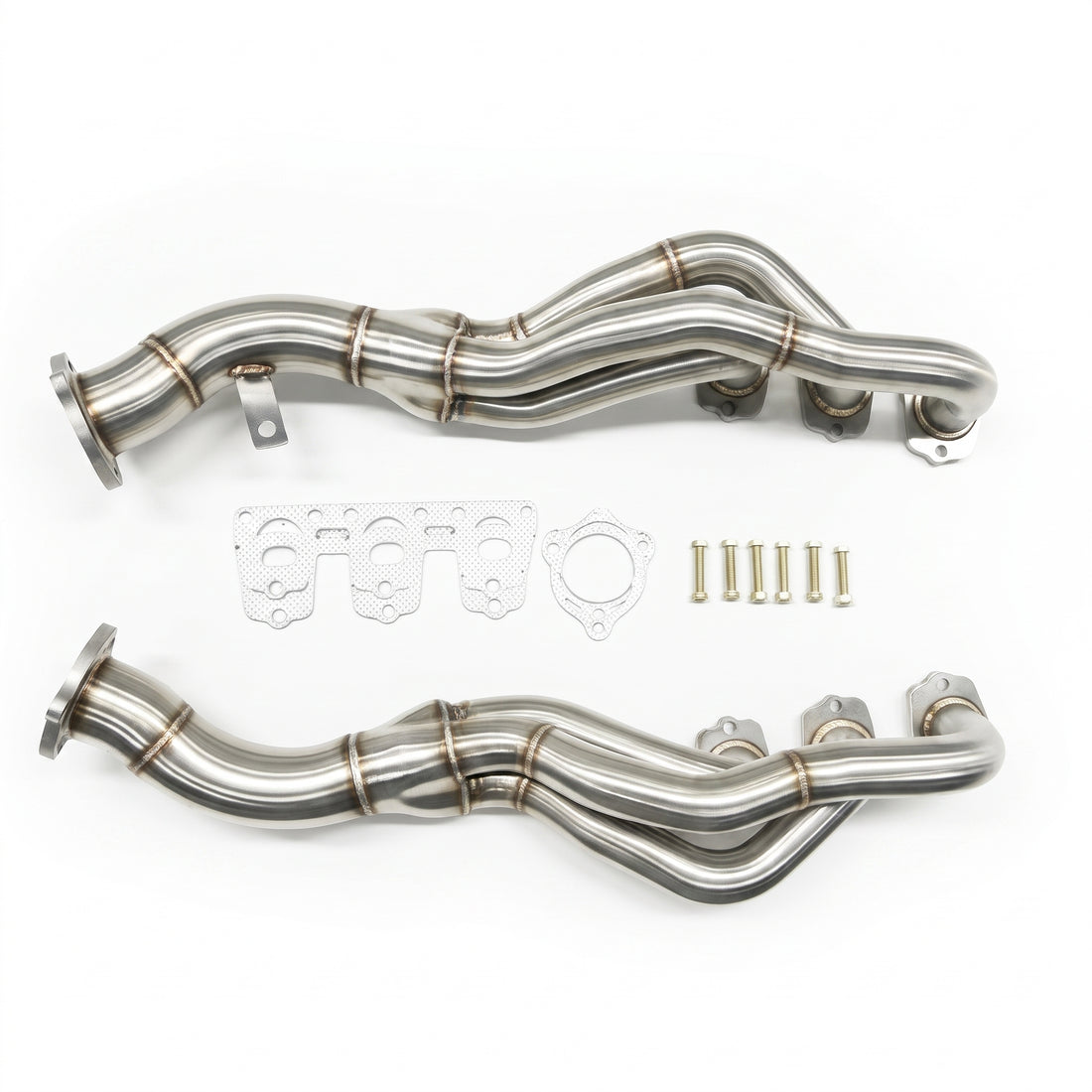 A pair of stainless steel exhaust headers with matching gaskets, washers, and mounting hardware, displayed on a clean white background.
