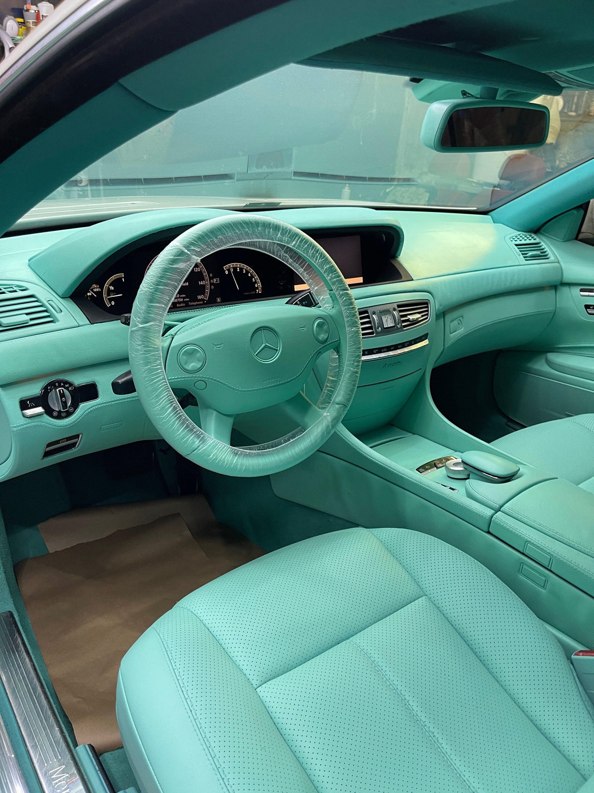 Auto Leather Dye exotic leather and vinyl dye in bright custom colors, showcasing vibrant color options for leather and vinyl surfaces.