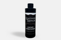 Auto Leather Dye Leather Conditioner 8oz bottle showing smooth leather surface and application nozzle for conditioning and care.