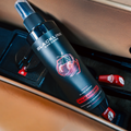 Blackline Car Care 8oz Wild Cherry car air freshener hanging from a vehicle interior for fresh, long-lasting scent.