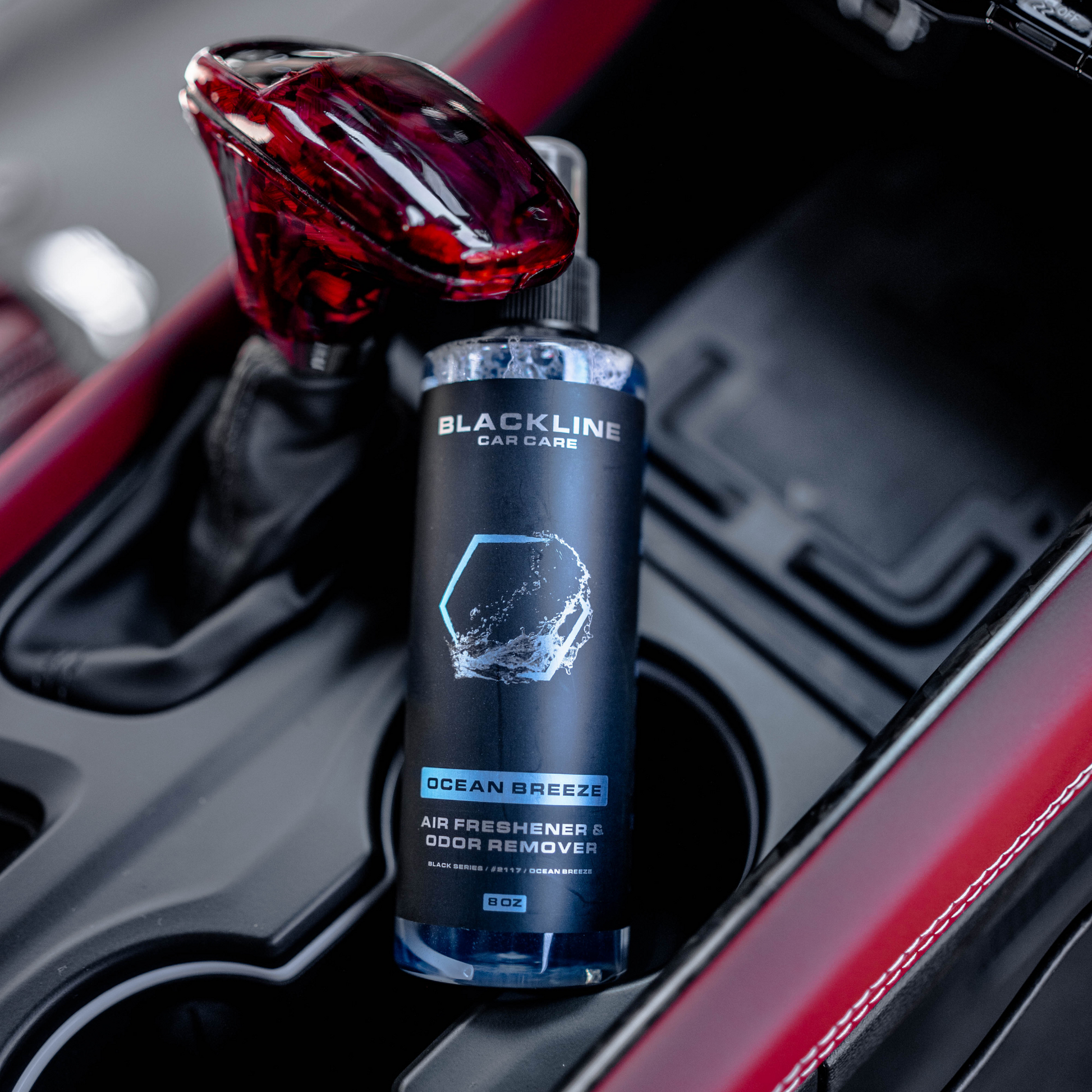 Blackline Car Care Wild Cherry 8oz car air freshener, single bottle with black and red packaging, freshening vehicle interior.