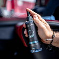 Blackline Car Care 8oz Wild Cherry car air freshener, single spray bottle with black packaging and label visible.