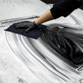Blackline Synthetic Clay Towel by Blackline Car Care, showcasing its durable, black microfiber surface designed for car detailing.