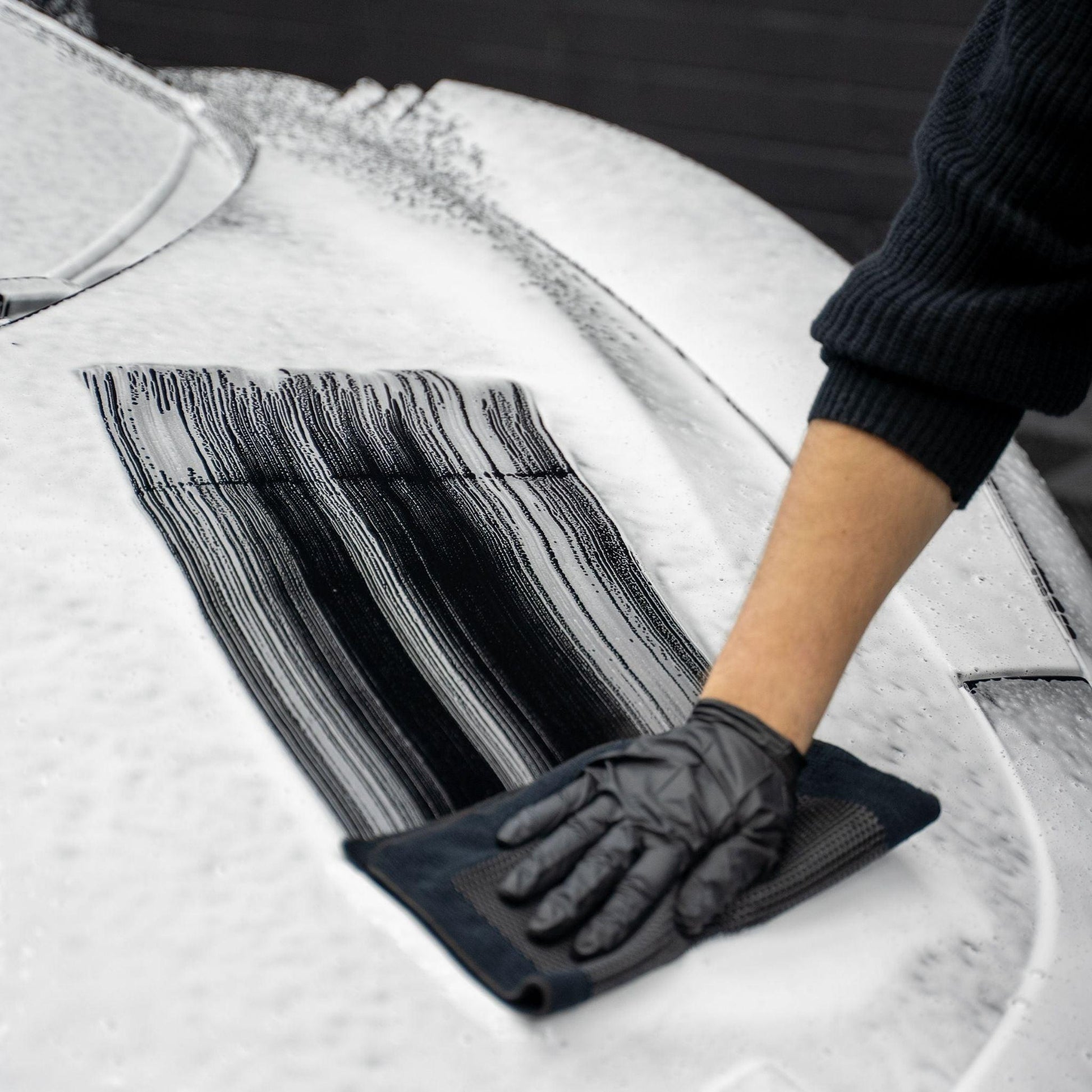 Blackline Synthetic Clay Towel from Blackline Car Care, soft black detailing cloth for car paint cleaning and polishing.