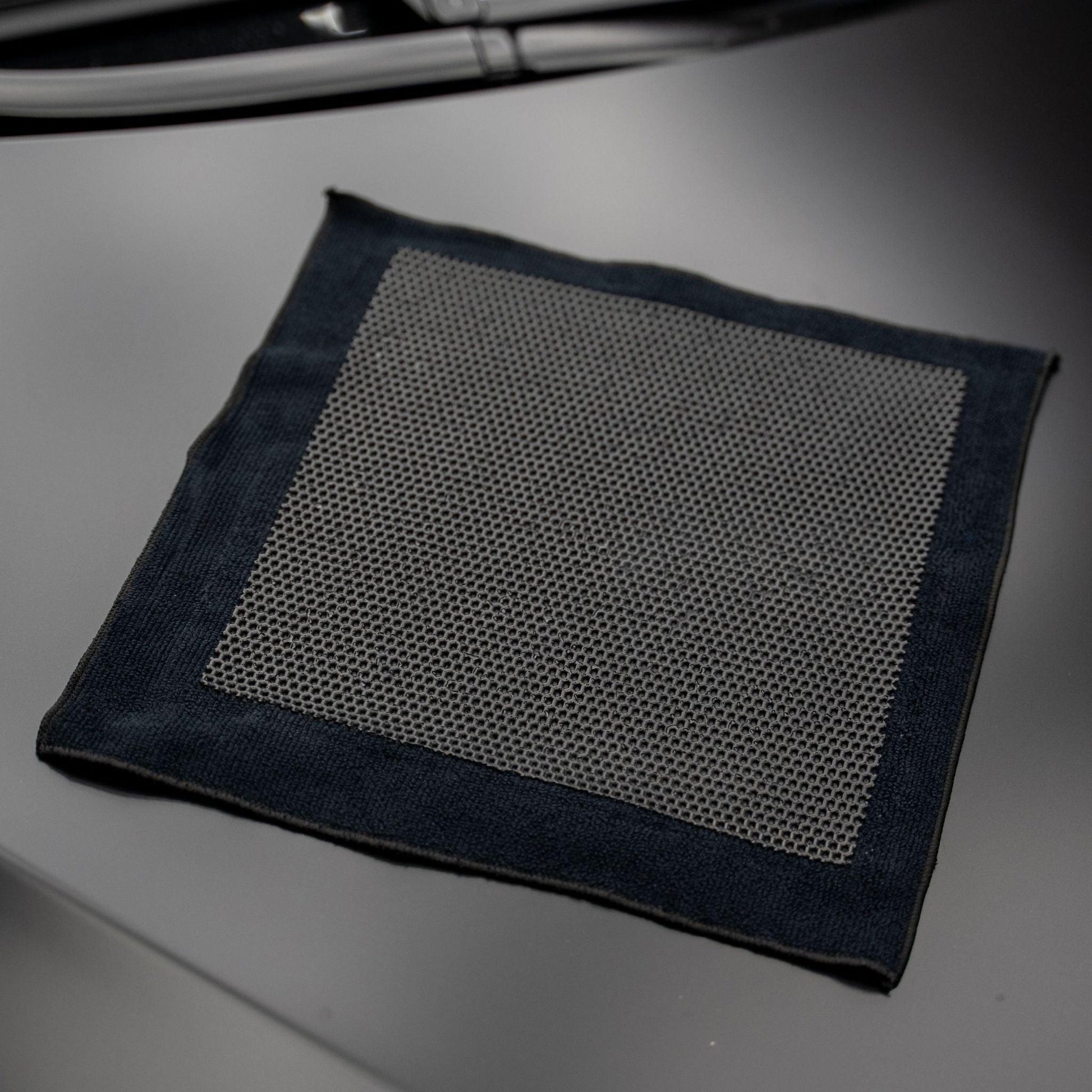 Blackline Synthetic Clay Towel in black, designed for car detailing and paint surface cleaning.