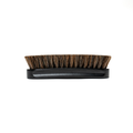 Blackline Leather Brush from Blackline Car Care for cleaning and conditioning leather surfaces in vehicles.