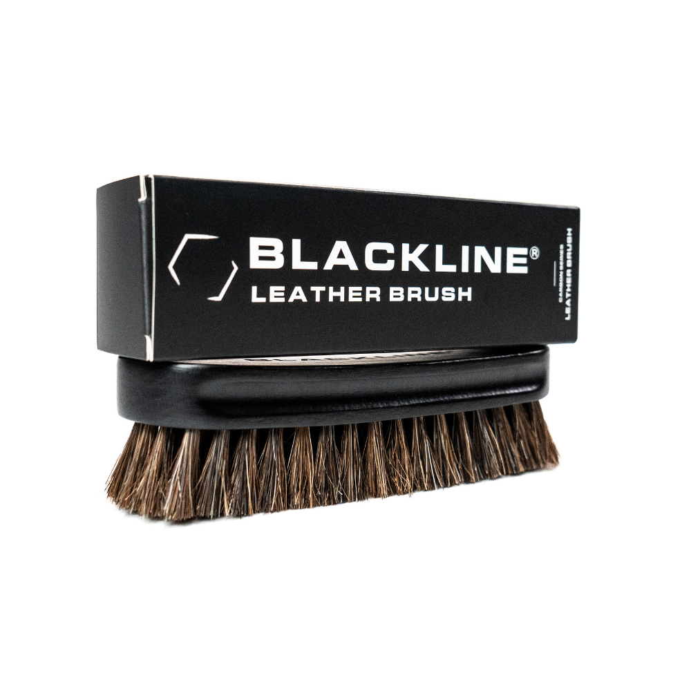 Blackline Leather Brush from Blackline Car Care, designed for cleaning and maintaining leather surfaces in vehicles.