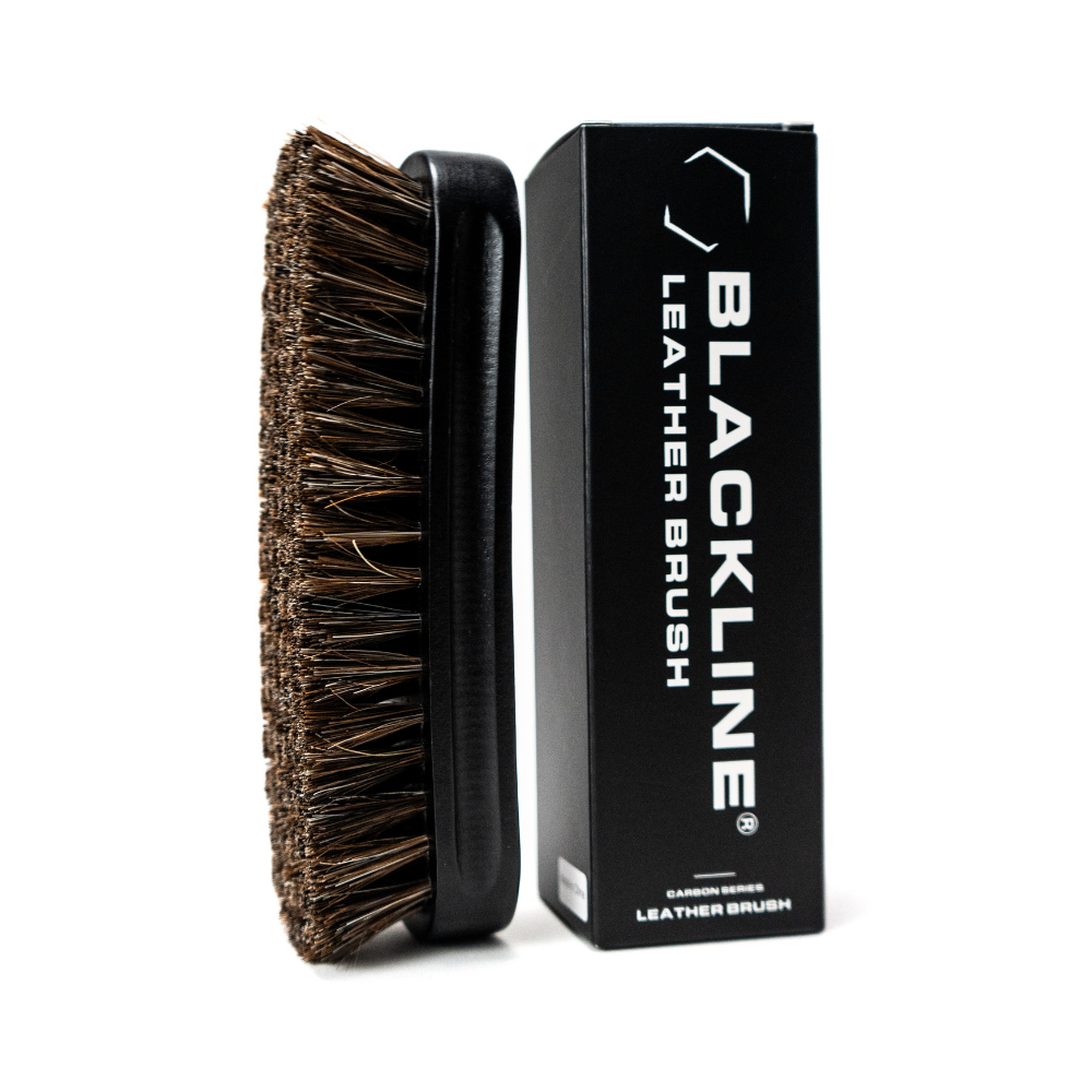 Blackline Car Care BLACKLINE® Leather Brush for cleaning and conditioning leather surfaces in vehicles.