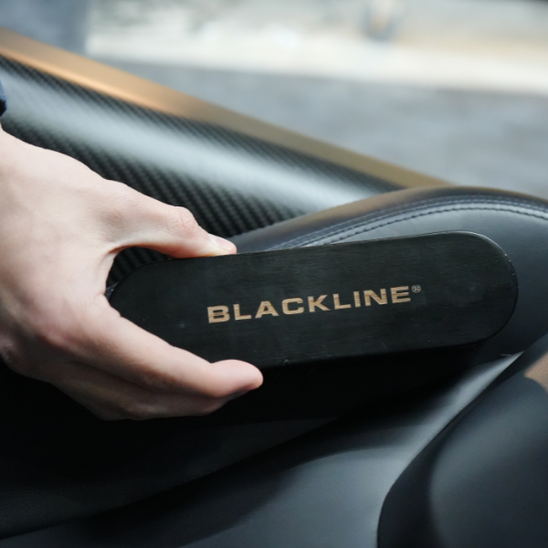 Blackline Leather Brush from Blackline Car Care, designed for cleaning and maintaining leather surfaces in vehicles.