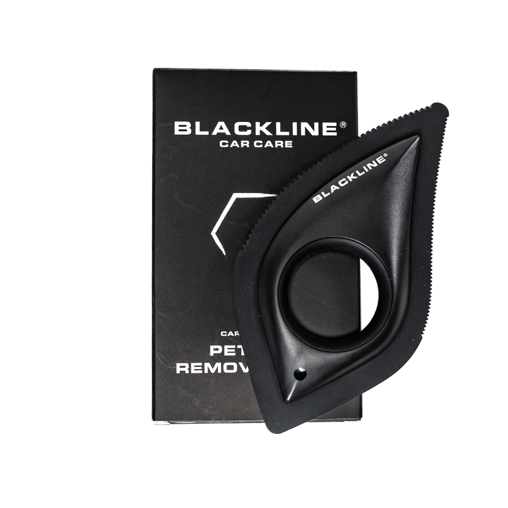 Blackline Pet Hair Brush from Blackline Car Care, showing a black grooming brush designed for removing pet hair from surfaces.