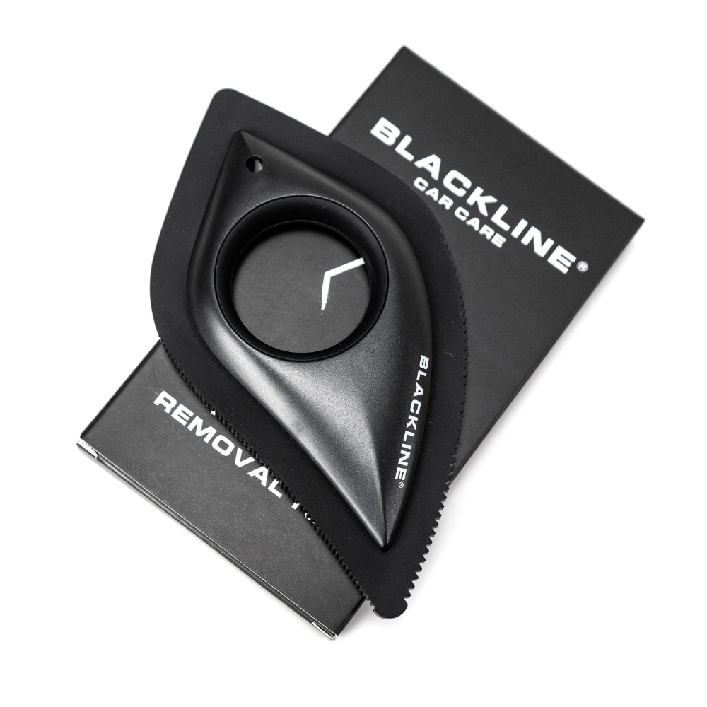 Blackline Pet Hair Brush by Blackline Car Care, with black bristles and ergonomic handle for removing pet hair from surfaces.