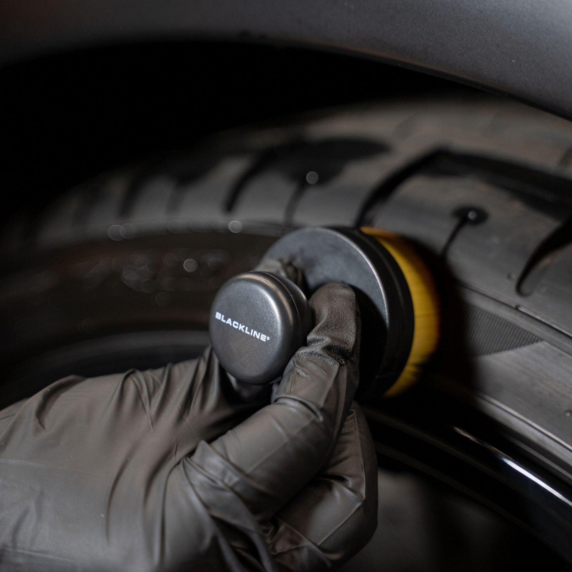 Blackline Car Care BLACKLINE® Tire Applicator Brush with black handle and bristles for tire cleaning and applying tire dressing.