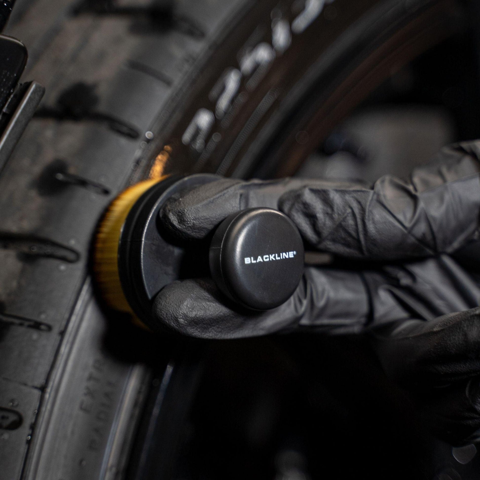 Blackline Car Care BLACKLINE® Tire Applicator Brush for applying tire care products to vehicle tires.