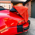 Blackline Car Care twisted-loop drying towel in black, showing its textured, absorbent fabric perfect for car drying.