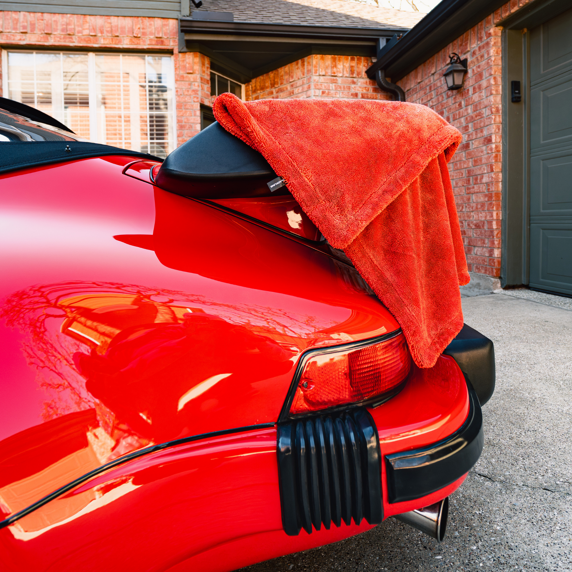 Blackline Car Care twisted-loop drying towel in black, showing its textured, absorbent fabric perfect for car drying.