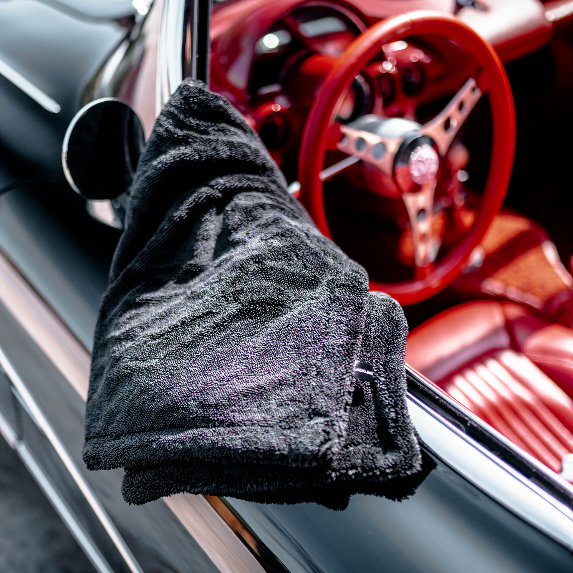 Blackline Car Care BLACKLINE® Twisted-Loop Drying Towel, a black microfiber drying towel with twisted-loop material for car drying.
