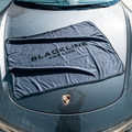 Blackline Car Care BLACKLINE® Slim Twisted-Loop Drying Towel draped over a car for quick, effective drying after washing.