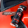 Blackline Car Care BLACKLINE® RESET interior cleaner and scent booster spray for cars, dark ice scent, bottle, and spray nozzle.