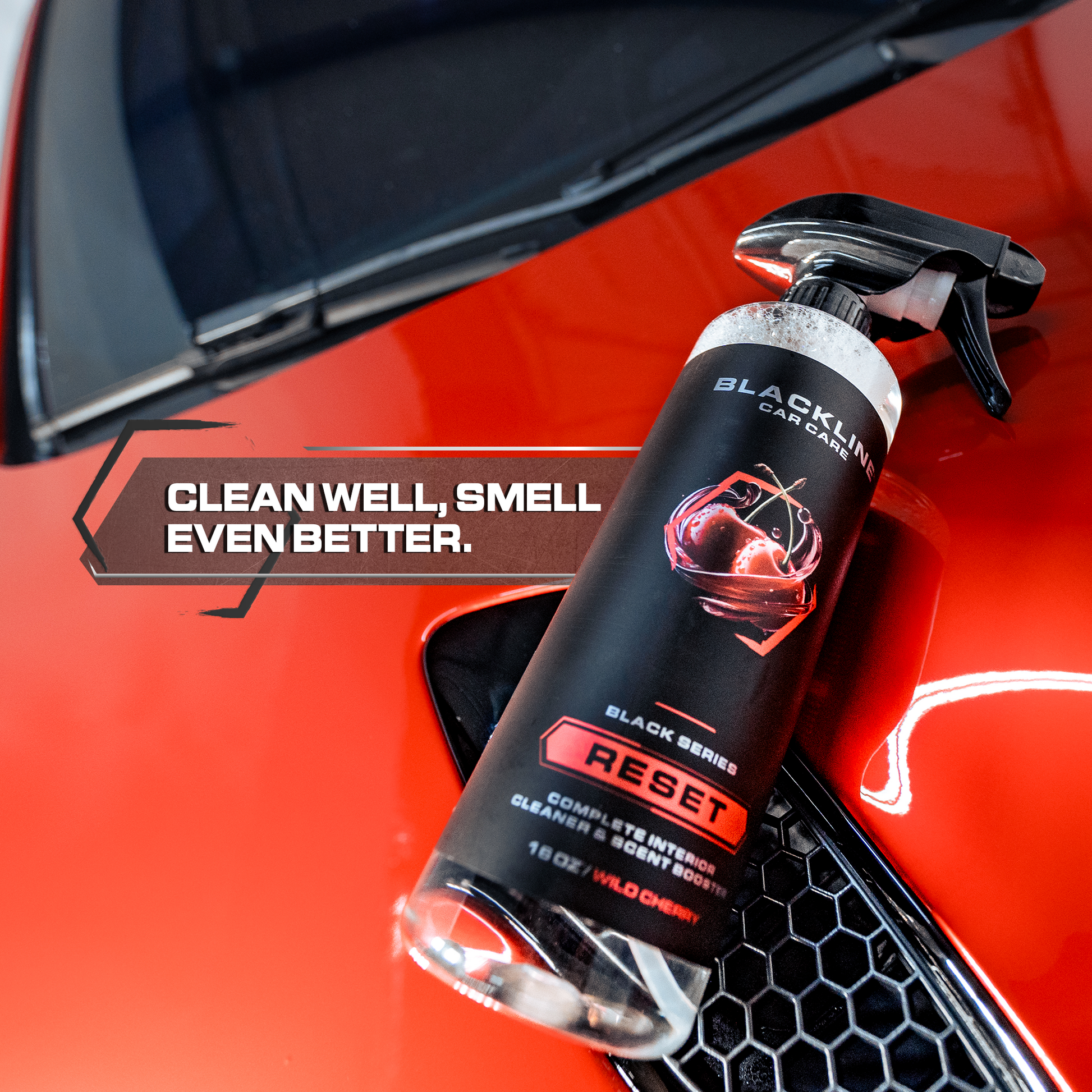 Blackline Car Care BLACKLINE® RESET interior cleaner and scent booster spray for cars, dark ice scent, bottle, and spray nozzle.