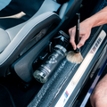 Blackline Car Care BLACKLINE® RESET Interior Cleaner and Scent Booster spray bottle on dark background