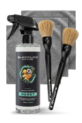 Blackline Car Care BLACKLINE® RESET interior cleaner and scent booster in a dark bottle, designed for car interior cleaning and freshening.