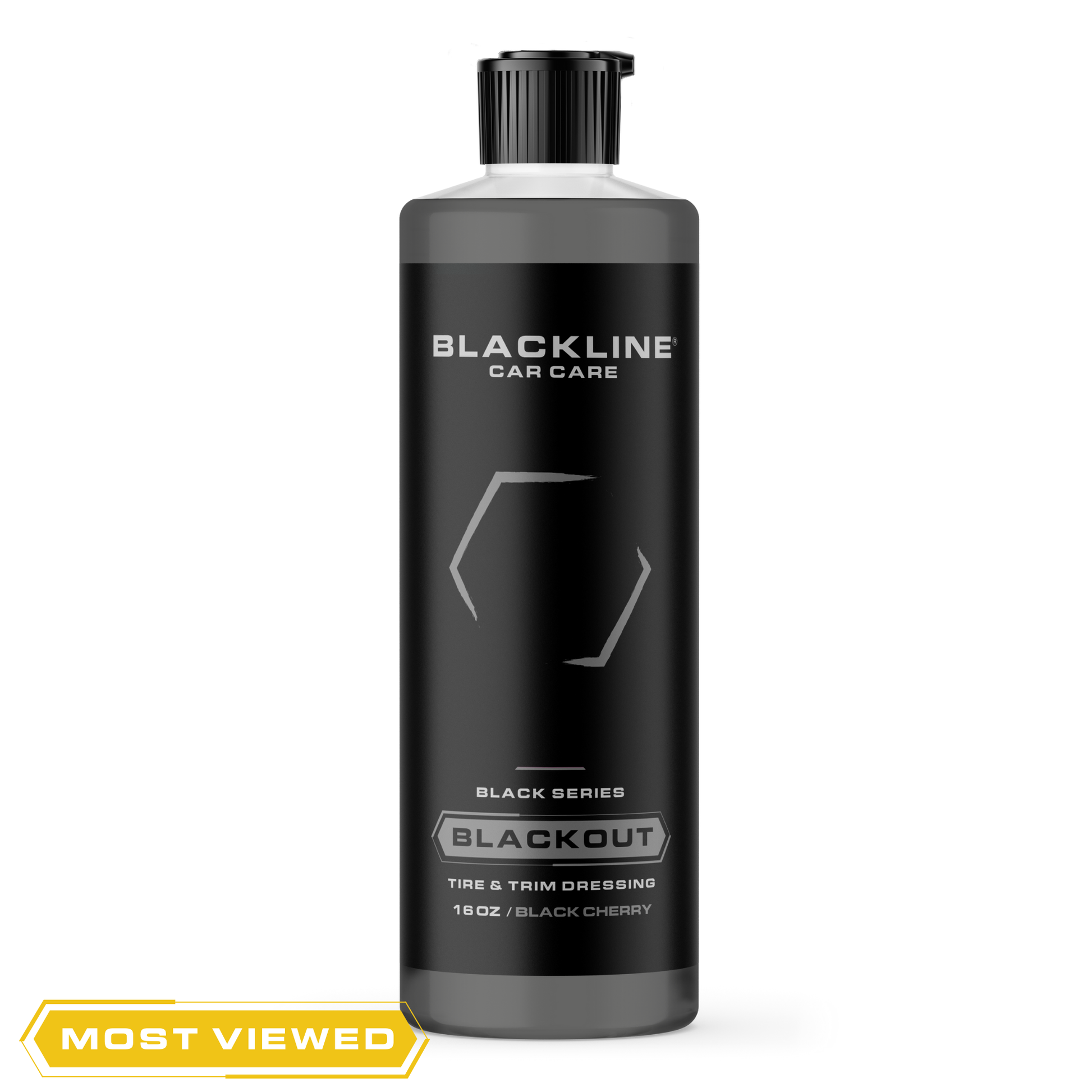 Blackline Car Care BLACKLINE® Blackout Trim & Tire Dressing spray applied to car trim and tires for a sleek, glossy finish.