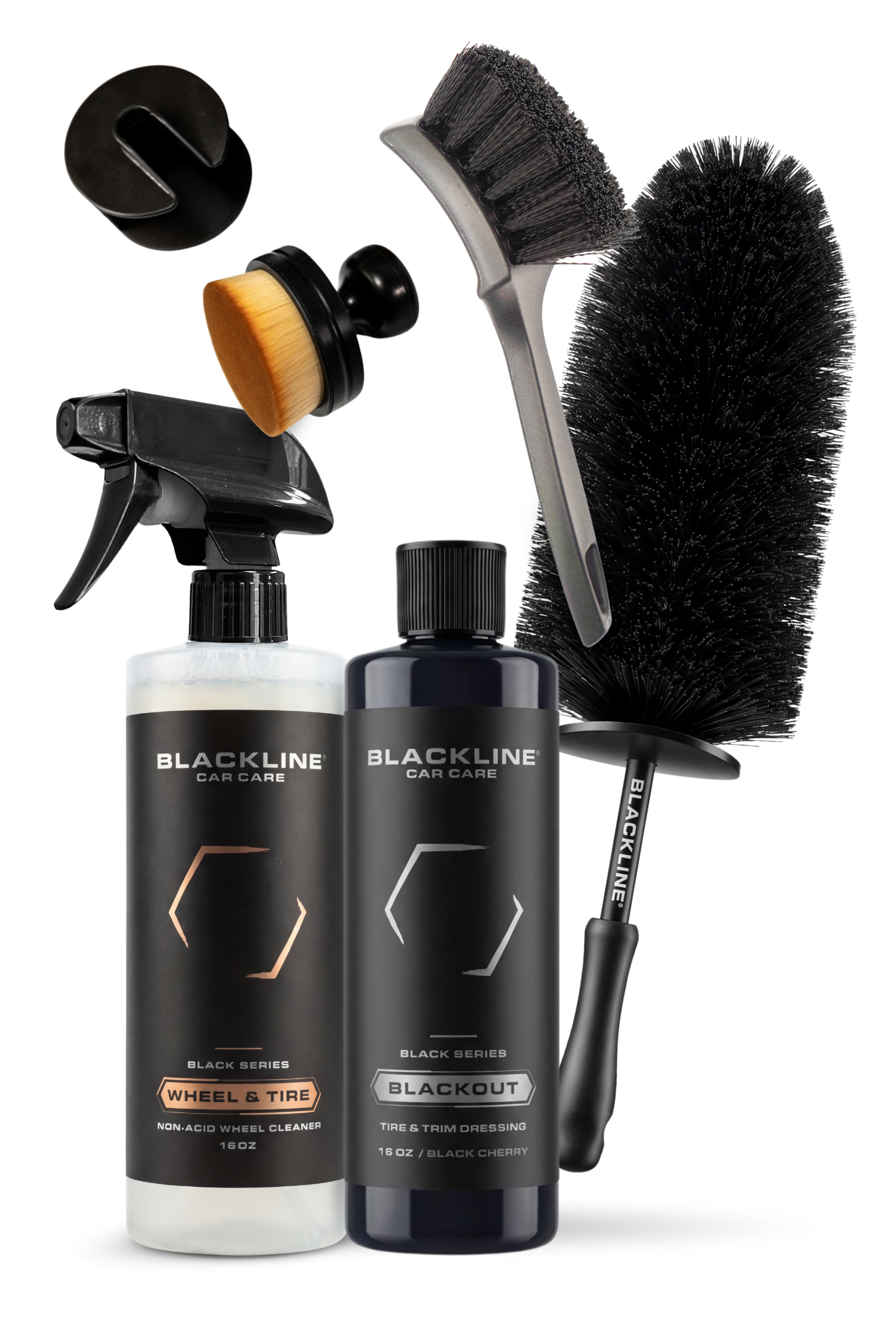 Blackline Car Care BLACKLINE® Blackout Trim & Tire Dressing spray applied to car tires and trim for a sleek, shiny finish.