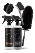 Blackline Car Care BLACKLINE® Blackout Trim & Tire Dressing spray on a car's trim and tires, enhancing shine and protection.