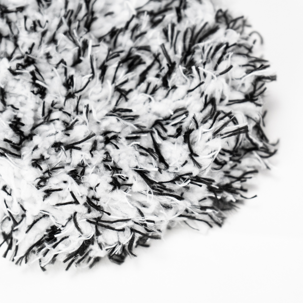 Blackline Car Care microfiber wheel mitt for car cleaning, showing soft microfiber material and hand-fitting design.