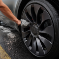 Blackline Car Care microfiber wheel mitt for cleaning car wheels, featuring soft, absorbent material for effective dirt removal.