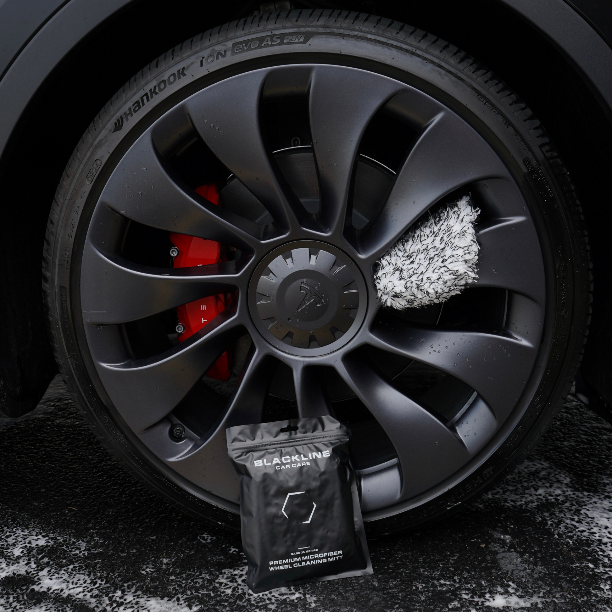 Blackline Car Care Blackline microfiber wheel mitt for cleaning car wheels, showcasing soft, durable material and easy grip design.