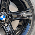 High-gloss Luna One Wheel Kits from DipYourCar.com, featuring sleek, shiny wheels with a reflective finish.
