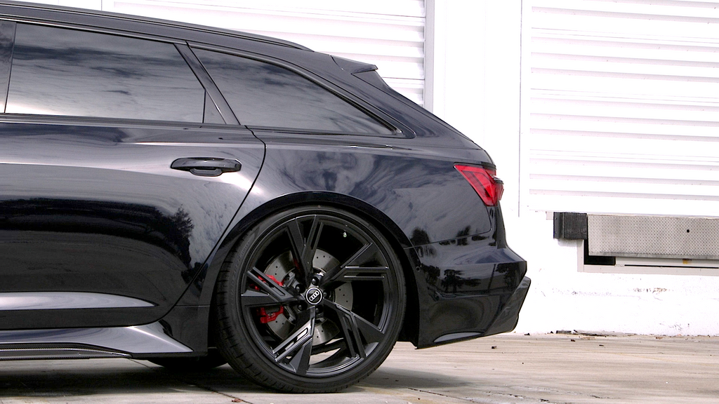 Black Emerald Metallic HyperDip aerosol spray from DipYourCar.com, showcasing a sleek metallic finish for vehicle customization.