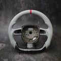 Audi A3 A4 A5 A6 Q5 Q7 S4 S5 custom steering wheel by Exclusive Steering, featuring a black leather grip and silver accents.