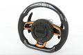 Custom Audi R8 and TT steering wheel by Exclusive Steering, featuring leather and metal accents, designed for 2008-2015 models.